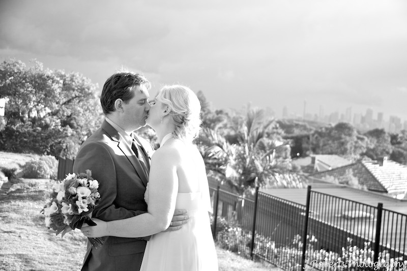 B&W couple kissing in sunset - wedding photography sydney